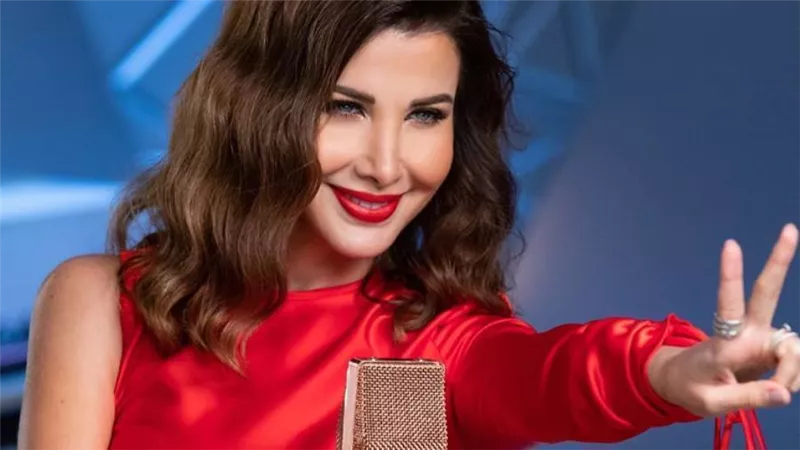 بالأحمر : نانسي عجرم تعلن عن عودتها بهذة الصورة