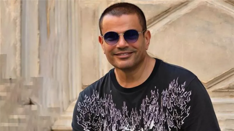 عمرو دياب يتصدر قائمة الأفضل على تطبيق أنغامى بأغنية الدنيا بترقص 