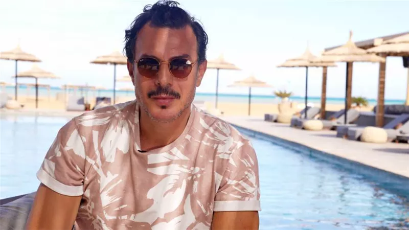 باسل خياط يتحدث في خبر أبيض عن جديده وقديمه وغلطته في السينما .. شاهد البرومو