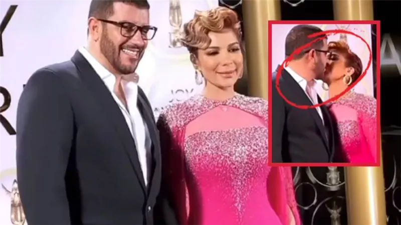 قبلة أصالة وزوجها فائق حسن تشعل ريد كاربت حفل توزيع جوائز Joy Awards